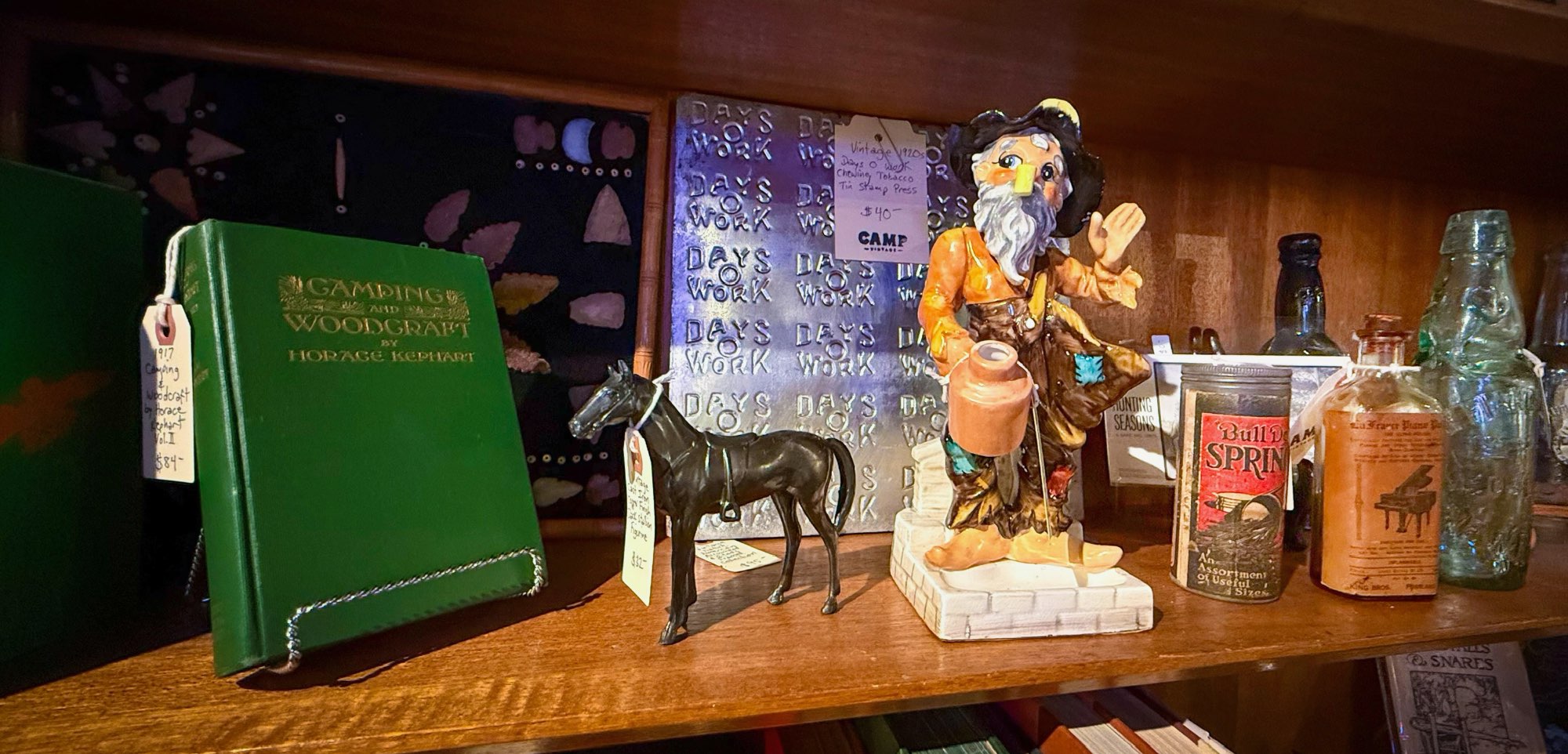 Various antiques on a shelf at Camp Vintage in Edmonds